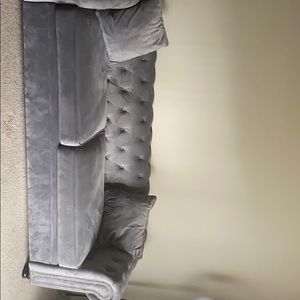 Slate/gray velvet couch.